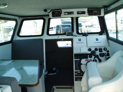 Interior cabin with dinette at left