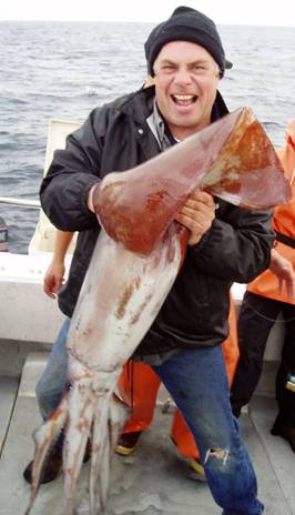Chris Monk with a giant Humboldt squid!!!!!!