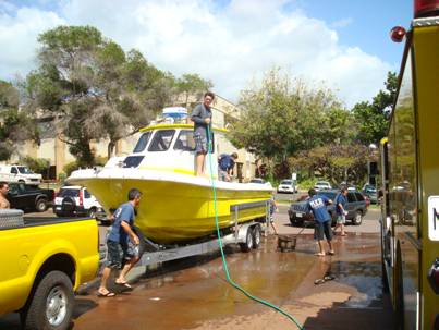 The whole crew washes the boat down afterwards