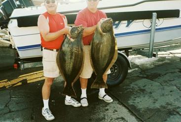 Jim Short and his friend Doug Bradley with their halibut